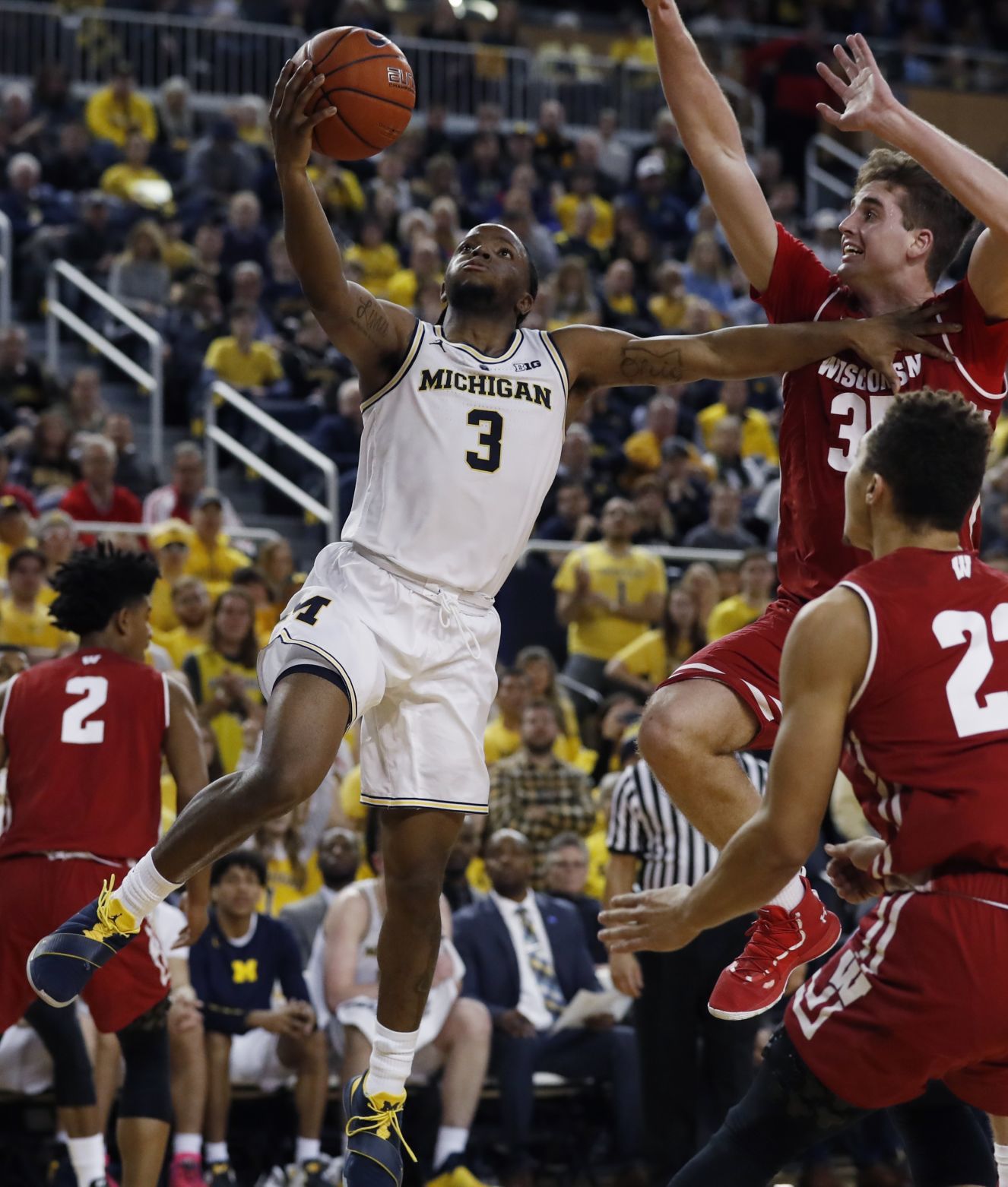 No. 7 Wolverines 61, No. 19 Badgers 52